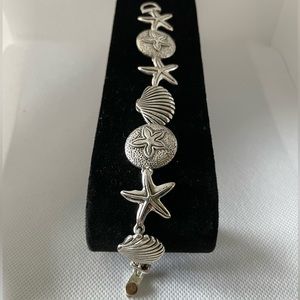 Mix link chain seashell charms silver tone bracelet